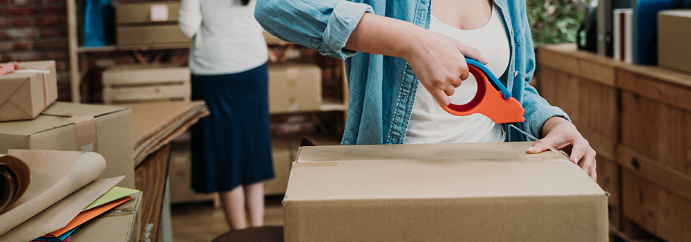 A girl packing a product 